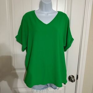 Green V-neck top